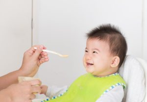 Mother Feeding Food